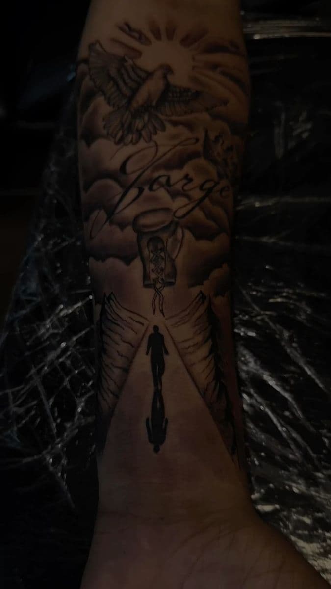 Memorial tribute forearm with dove and walking figure
