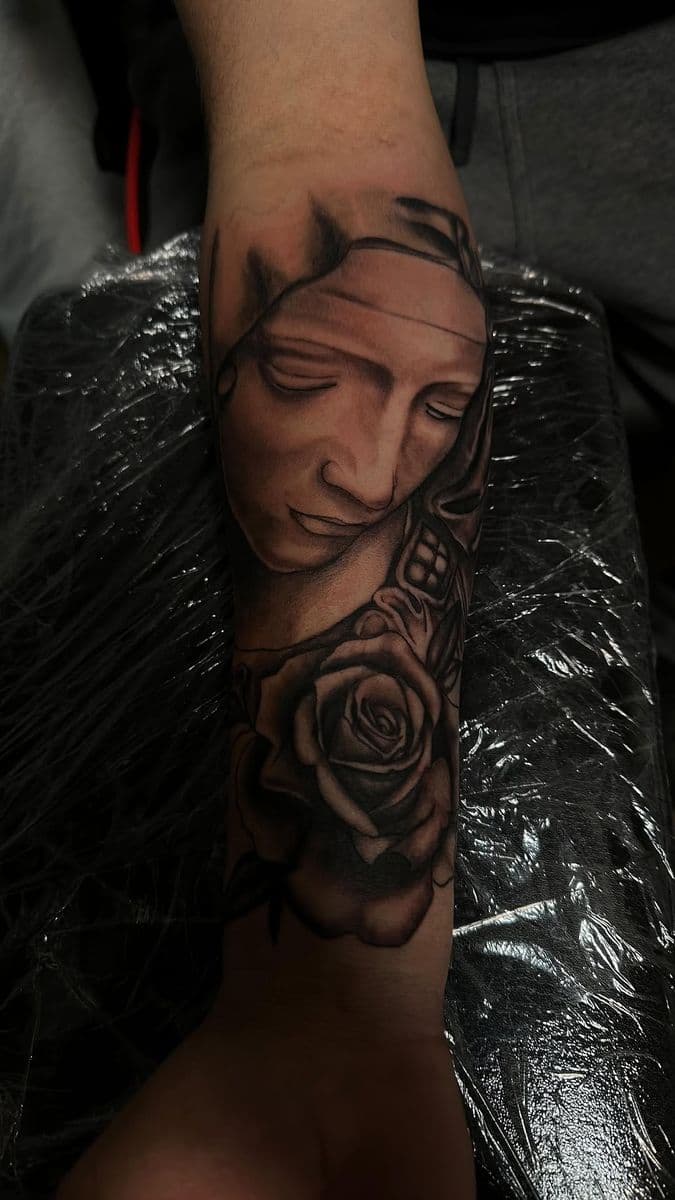 Virgin Mary and rose black and grey realism forearm