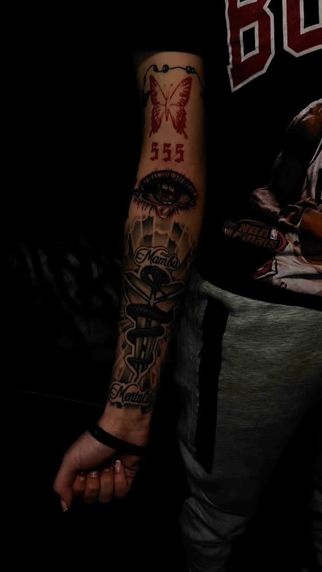 Mamba Mentality sleeve with red butterfly and realism eye